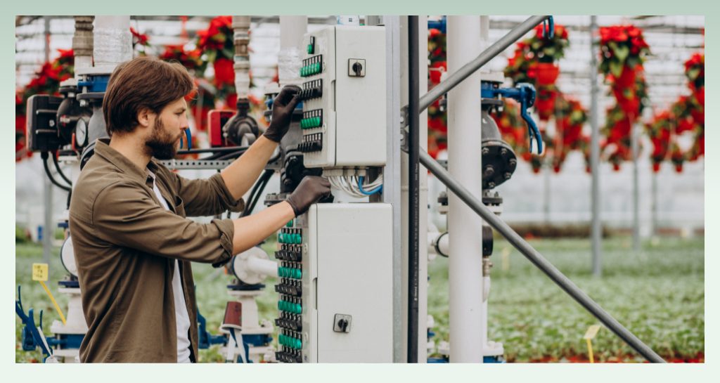 person-adjusting-panel-in-greenhouse-for-electrical-business-name-ideas